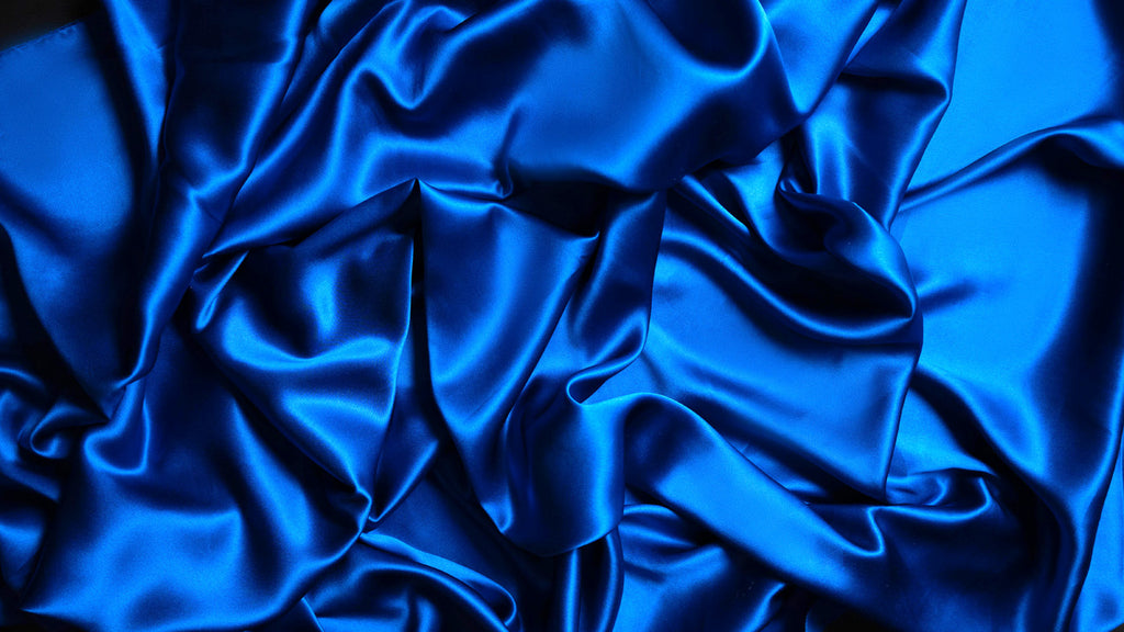 Premium Photo  Red silk or satin luxury fabric texture can use as