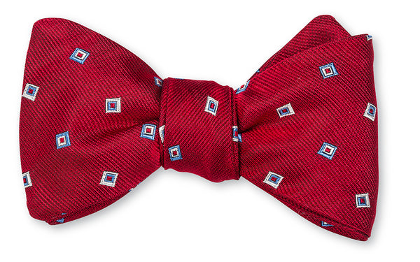 red tossed squares bow tie