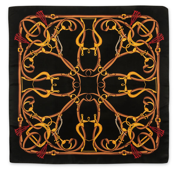 A square black scarf featuring a symmetrical, kaleidoscopic pattern of golden-yellow and brown horse bits and reins, accented with small red tassels at the corners.