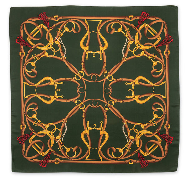 A square silk scarf featuring an intricate equestrian design with golden and brown horse bits and reins on a dark forest green background, finished with red tassels in the corners.